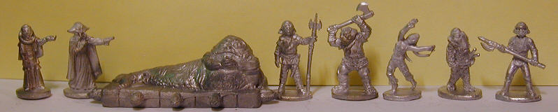 les 8 figurines de la bote
